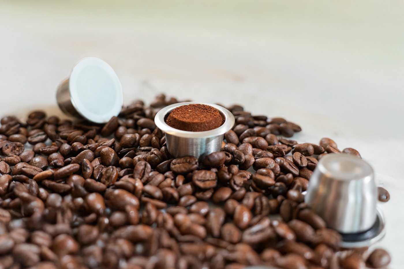 Capsules réutilisables et grains de café